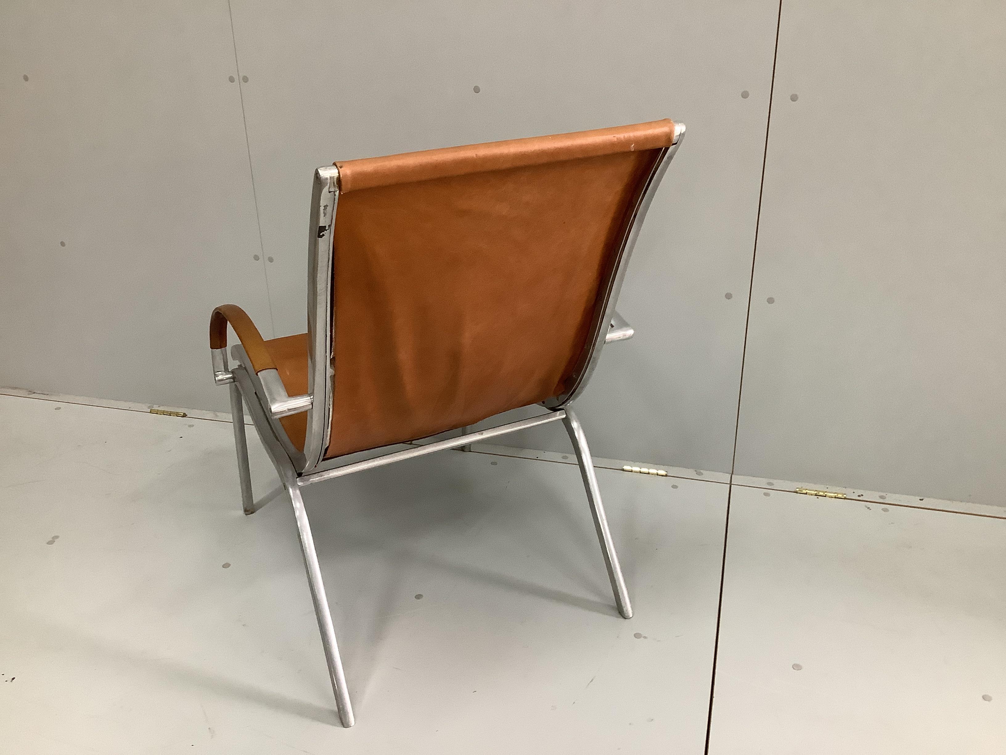 A 1970's armchair in the style of Rudolf Szedleczky, width 65cm, depth 84cm, height 94cm